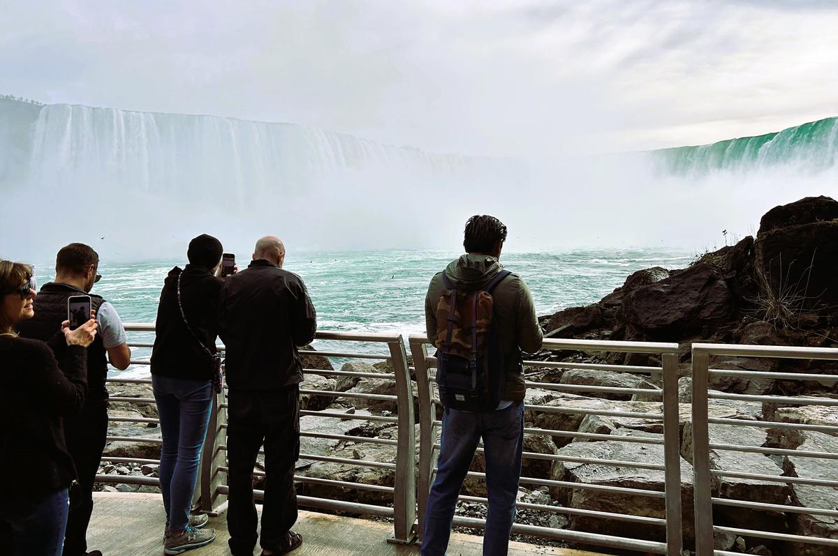Visitors view Horseshoe Falls from the platform on the Niagara River’s edge outside of the renovated Niagara Parks Power Station. (Colleen Thomas/TNS)