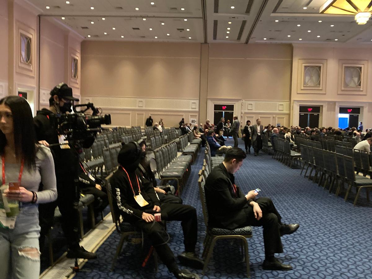 The front of the Potomac Ballroom at the Gaylord National Resort & Convention Center was filled, but these rear rows were still waiting for occupants about 15 minutes before former President Donald Trump took the stage at CPAC near Washington, on March 4, 2023. (Janice Hisle/The Epoch Times)