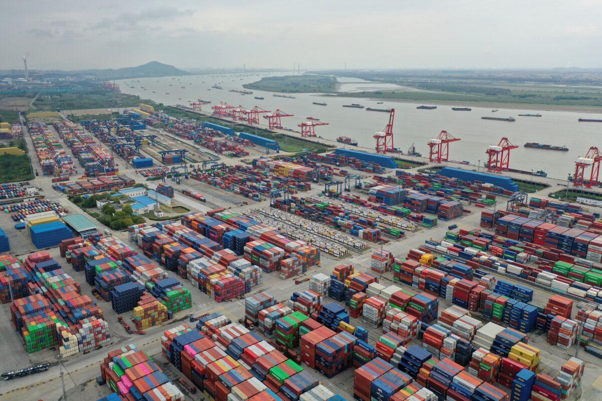 Shipping containers are pictured at a port in Nanjing in eastern China's Jiangsu province, on Oct. 27, 2022. (Chinatopix via AP)