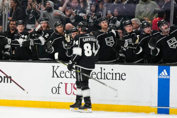 Los Angeles Kings' Vladislav Gavrikov (84) celebrates his goal with teammates during the second period of an NHL hockey game against the Washington Capitals in Los Angeles March 6, 2023. (Jae C. Hong/AP Photo)
