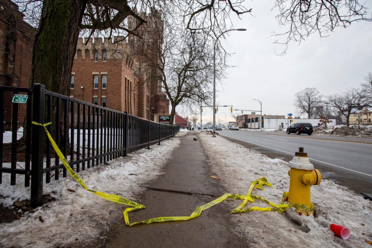 Police tape remains on the ground outside of the Main Street Armory in Rochester, N.Y., on March 6, 2023. (Lauren Petracca/AP Photo)