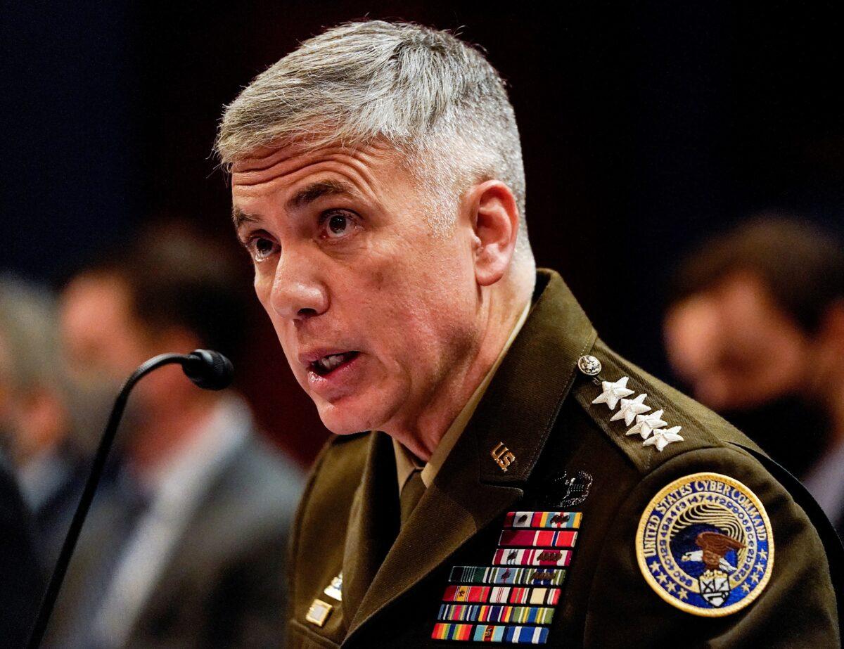 Retiring National Security Agency Director Gen. Paul Nakasone, testifying before a House panel in 2021, says re-authorizing FISA's Section 702 is "critical" to national security. (Elizabeth Frantz/Reuters)