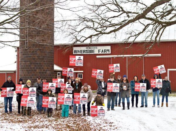 Protestors in front of Riverside Farm, a 120-year-old farmstead on the lot slated for the new Ford EV battery park in Marshall, Mich., in February 2023. (Courtesy of Seed Keepers)