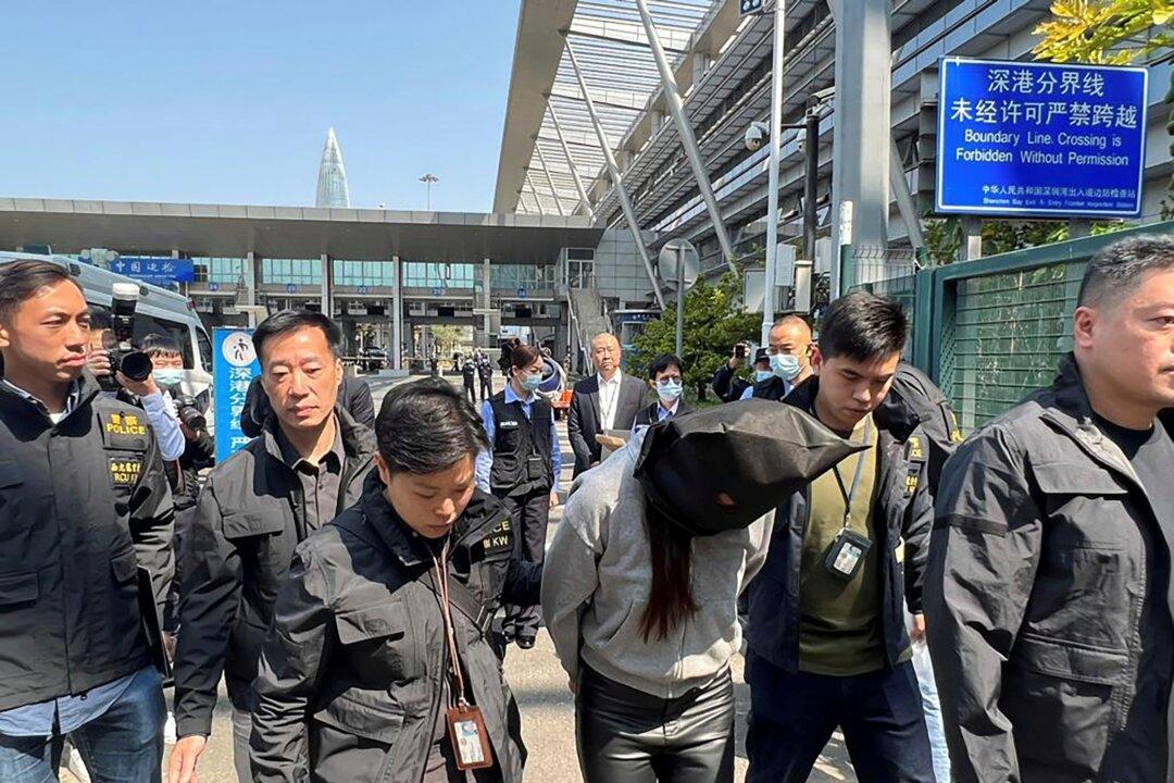 Woman Arrested in Gruesome Killing of Hong Kong Model