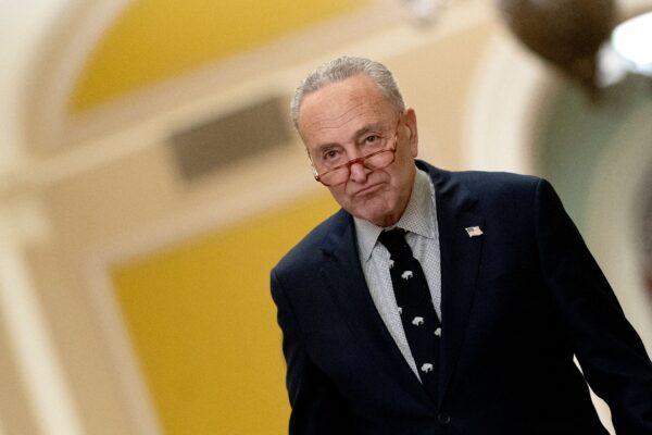 Senate Majority Leader Chuck Schumer (D-N.Y.) walks to speak to members of the media at the U.S. Capitol in Washington on March 2, 2023. (Stefani Reynolds/AFP via Getty Images)