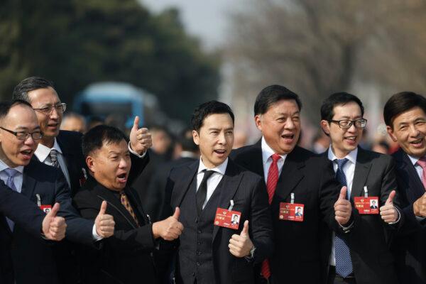 Actor Donnie Yen Ji-dan, (C) attends the opening of the first session of the 14th Chinese People's Political Consultative Conference (CPPCC) at The Great Hall of People in Beijing on March 4, 2023. (Lintao Zhang/Getty Images)