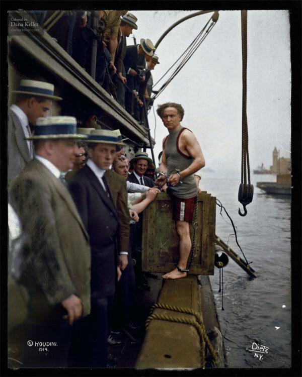 Harry Houdini defied drowning with underwater escapes, seen here (R) as he steps in a crate for an underwater plunge. (Public Domain)