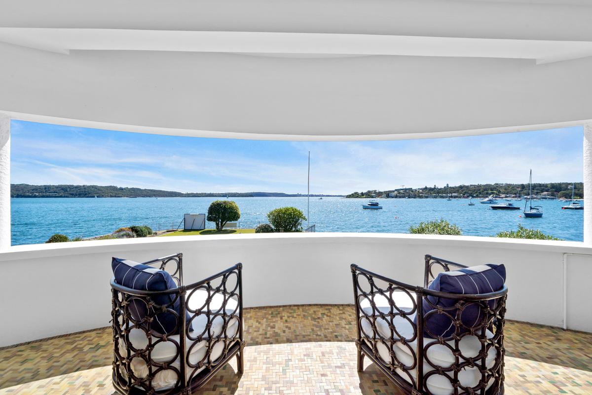 Shielded from the sun and cooled by a soft breeze, this balcony is an ideal place to relax and enjoy the view. (Courtesy of Sydney Sotheby's International Realty)
