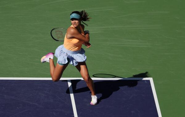 Emma Raducanu of Great Britain in action against Danka Kovinic of Montenegro in the first round during the BNP Paribas Open in Indian Wells, Calif., on March 9, 2023. (Julian Finney/Getty Images)