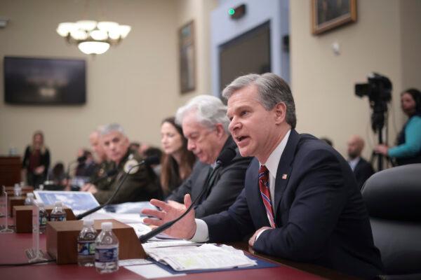 FBI Director Christopher Wray (right), CIA Director William Burns, Director of National Intelligence Avril Haines, Director of the National Security Agency Gen. Paul Nakasone, and Defense Intelligence Agency Director Lt. Gen. Scott Berrier testify during a House Select Committee on Intelligence hearing concerning worldwide threats, on Capitol Hill in Washington on March 9, 2023. (Win McNamee/Getty Images)