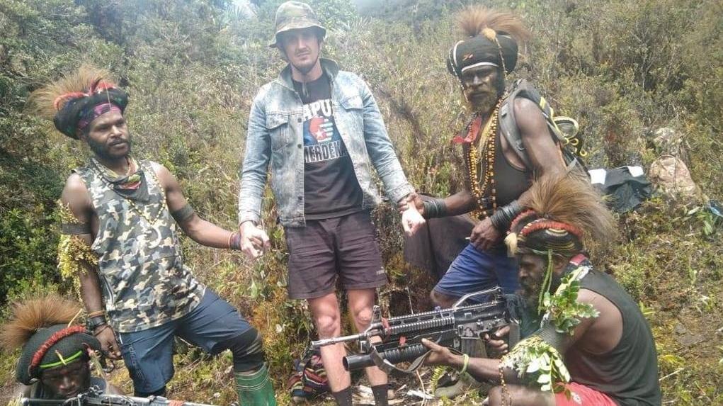 Philip Mehrtens stands among the separatist fighters in Indonesia's Papua region, in this undated picture released on Feb. 14, 2023. (The West Papua National Liberation Army (TPNPB)/Handout via Reuters)