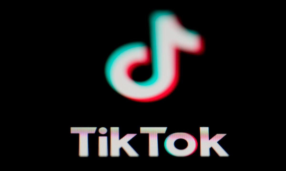 The icon for the video sharing TikTok app is seen on a smartphone on Feb. 28, 2023. (Matt Slocum/AP Photo)