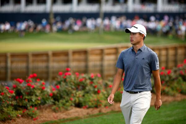 Collin Morikawa of the United States walk to the 17th tee during the first round of THE PLAYERS Championship on THE PLAYERS Stadium Course at TPC Sawgrass in Ponte Vedra Beach, Fla., on March 9, 2023. (Jared C. Tilton/Getty Images)