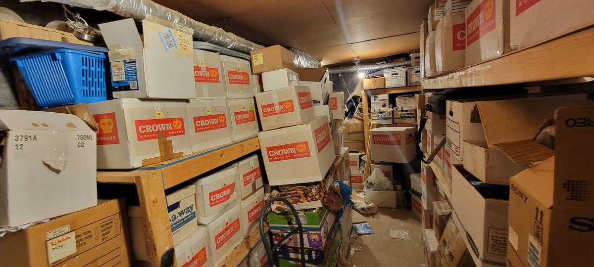 Another view of the storage unit, showing boxes stacked from floor to ceiling. (Courtesy of Fridrik)