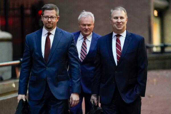 Former Ohio Republican Party Chairman Mathew Borges (R) walks toward Potter Stewart U.S. Courthouse with his attorneys Todd Long (L) and Karl Schneider (C) before jury selection for his federal trial in Cincinnati, Ohio, on Jan. 20, 2023. (Joshua A. Bickel/AP Photo)