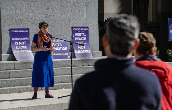 Detransitioners—people who regret and try to reverse previous efforts to live as another gender—and their supporters hold a rally on the steps of the California State Capitol in Sacramento, Calif., on March 10, 2023. (John Fredricks/The Epoch Times)