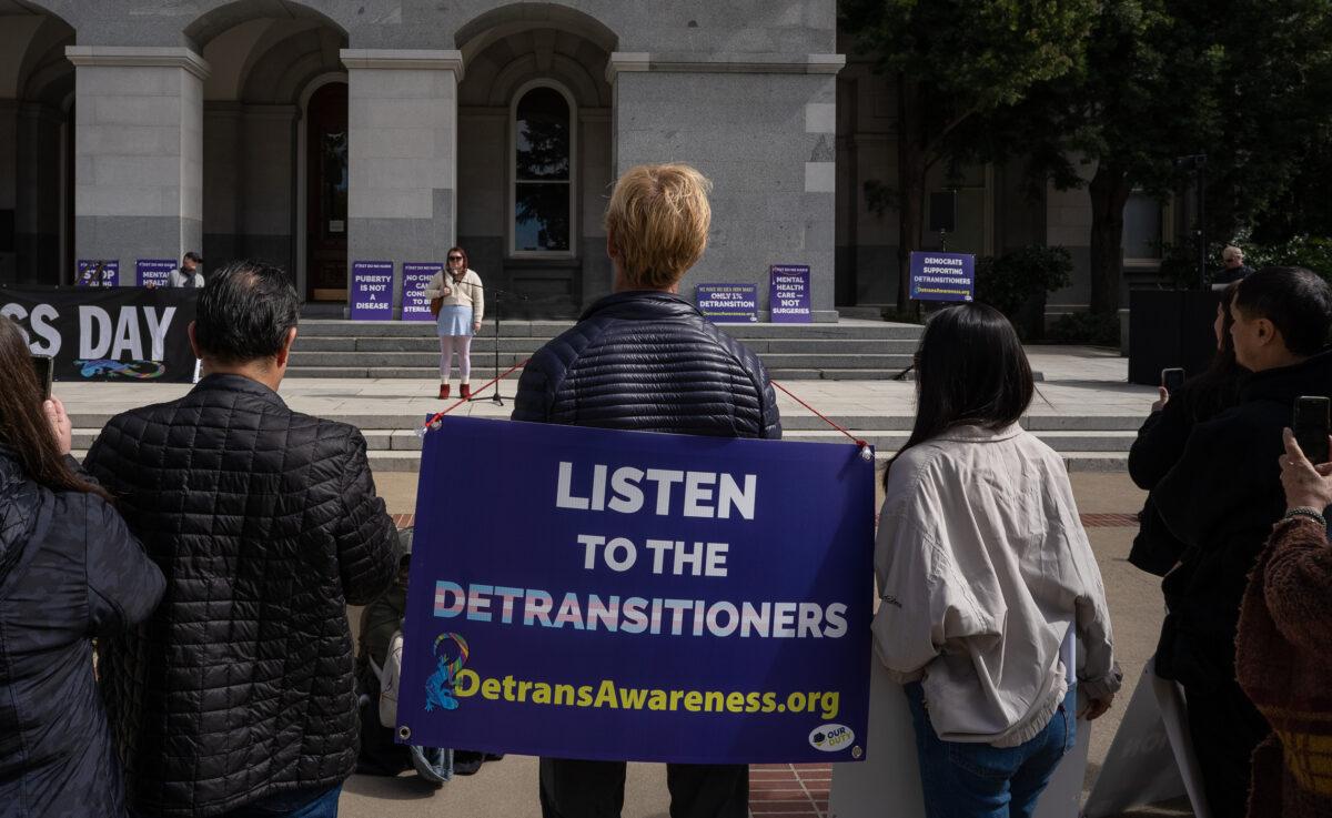 Detransitioners and their supporters hold a rally on the steps of the California state Capitol in Sacramento on March 10, 2023. (John Fredricks/The Epoch Times)