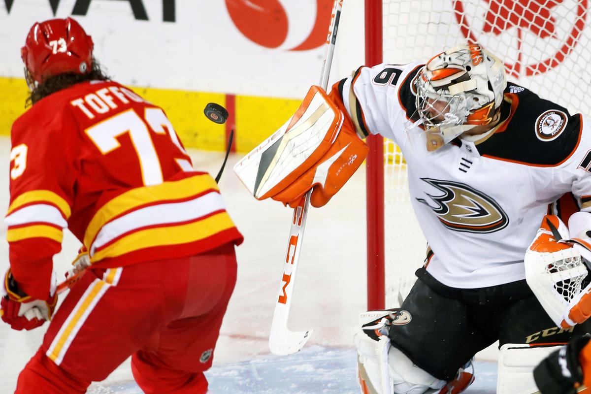 Anaheim Ducks goalie John Gibson, makes a save against Calgary Flames' Tyler Toffoli during the second period of an NHL hockey game in Calgary, Alberta, on March 10, 2023. (Larry MacDougal/The Canadian Press via AP)