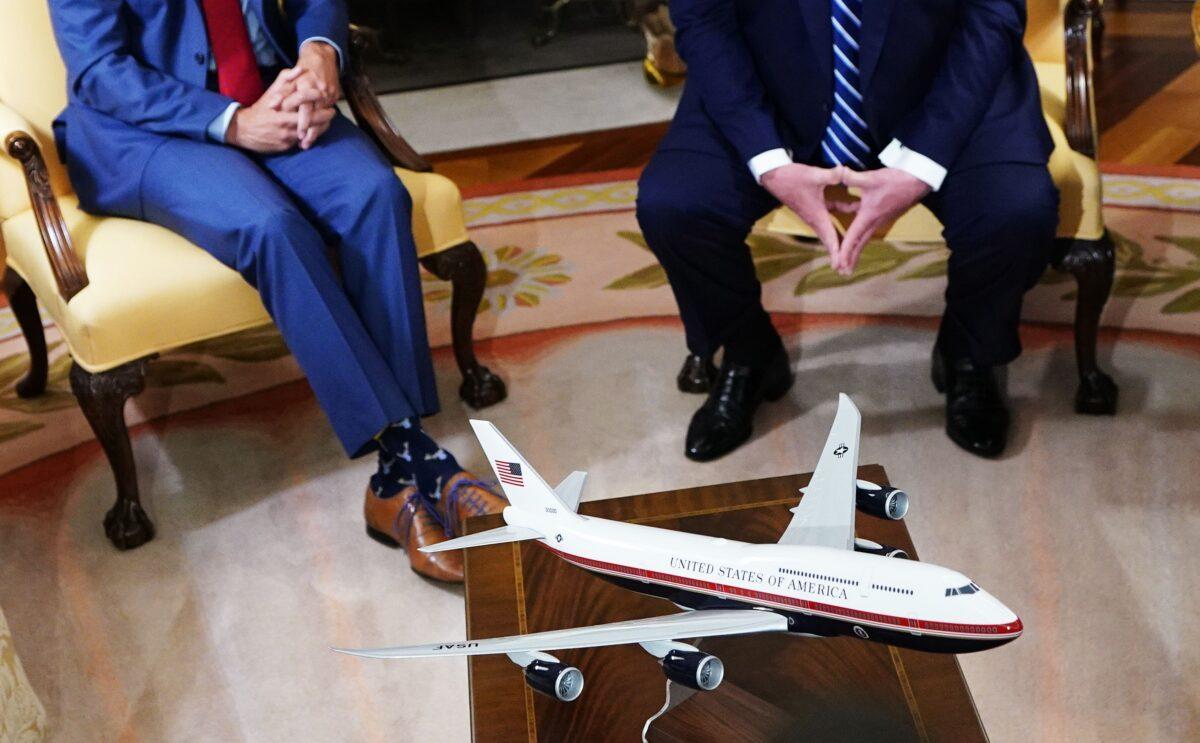 A model of Air Force One sporting a new color scheme is seen during a bilateral meeting between President Donald Trump (R) and Canada's Prime Minister Justin Trudeau in the Oval Office of the White House in Washington, DC, on June 20, 2019. (Mandel Ngan/AFP via Getty Images)