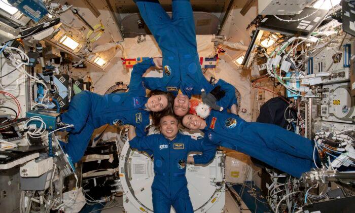 Anna Kikina of Roscosmos (L), Koichi Wakata of JAXA, Josh Cassada, and Nicole Mann of NASA on the International Space Station's Kibo laboratory module on March 1, 2023. (NASA via AP)