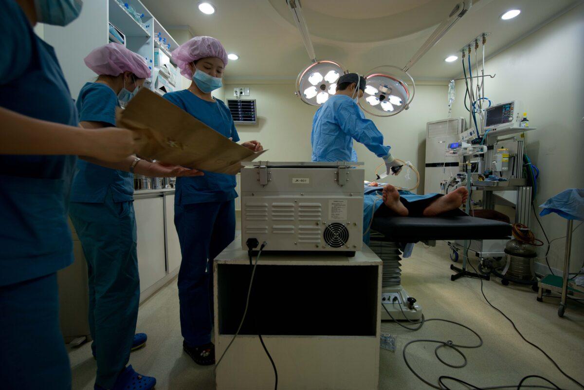 Doctors were performing a liposuction procedure at the JK Medical Group plastic surgery hospital in Seoul, South Korea on July 12, 2013. (Ed Jones/AFP via Getty Images)