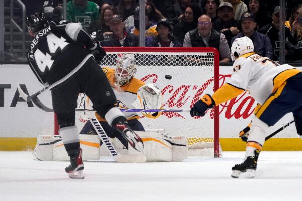 Los Angeles Kings defenseman Mikey Anderson (44) scores past Nashville Predators goaltender Kevin Lankinen during the first period of an NHL hockey game in Los Angeles on March 11, 2023. (Marcio Jose Sanchez/AP Photo)