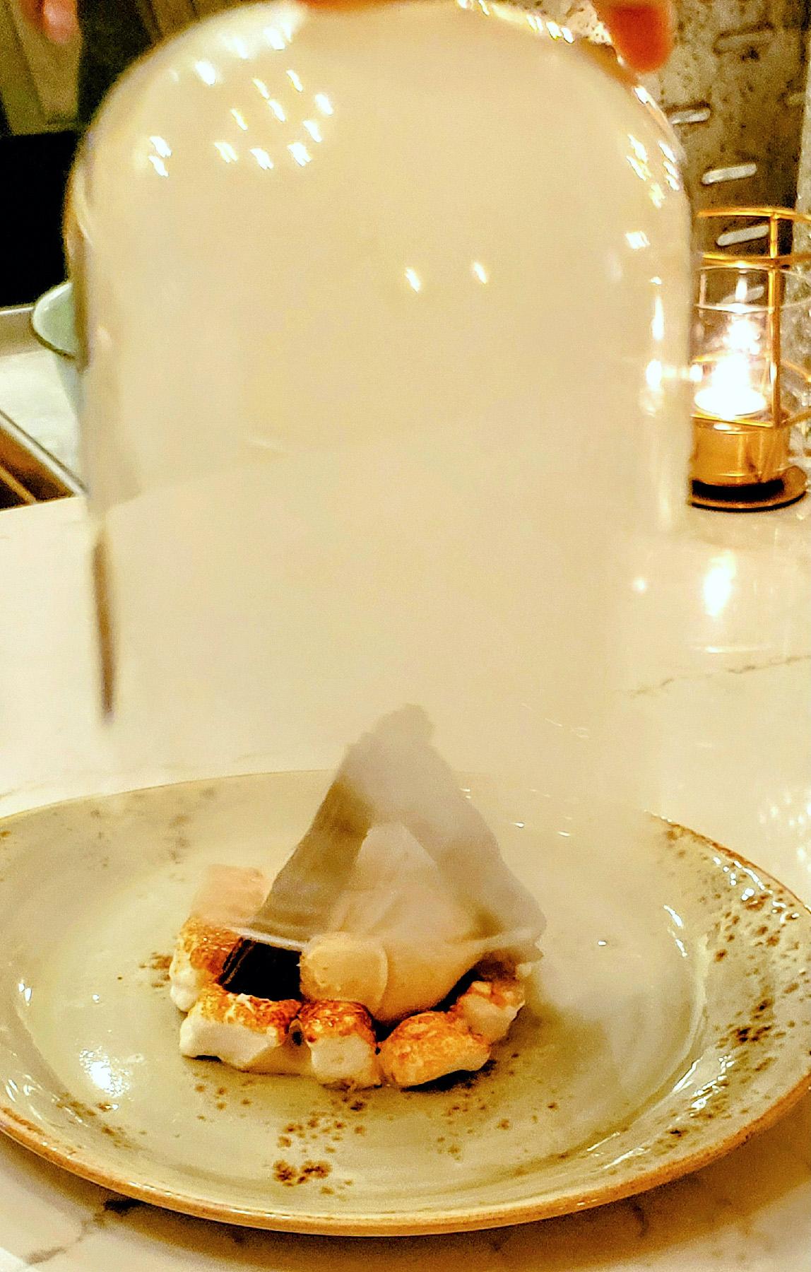 The dessert s’mores at Crafted in Yakima, Washington, are served under a smoky bell jar. (Photo courtesy of Jim Farber)