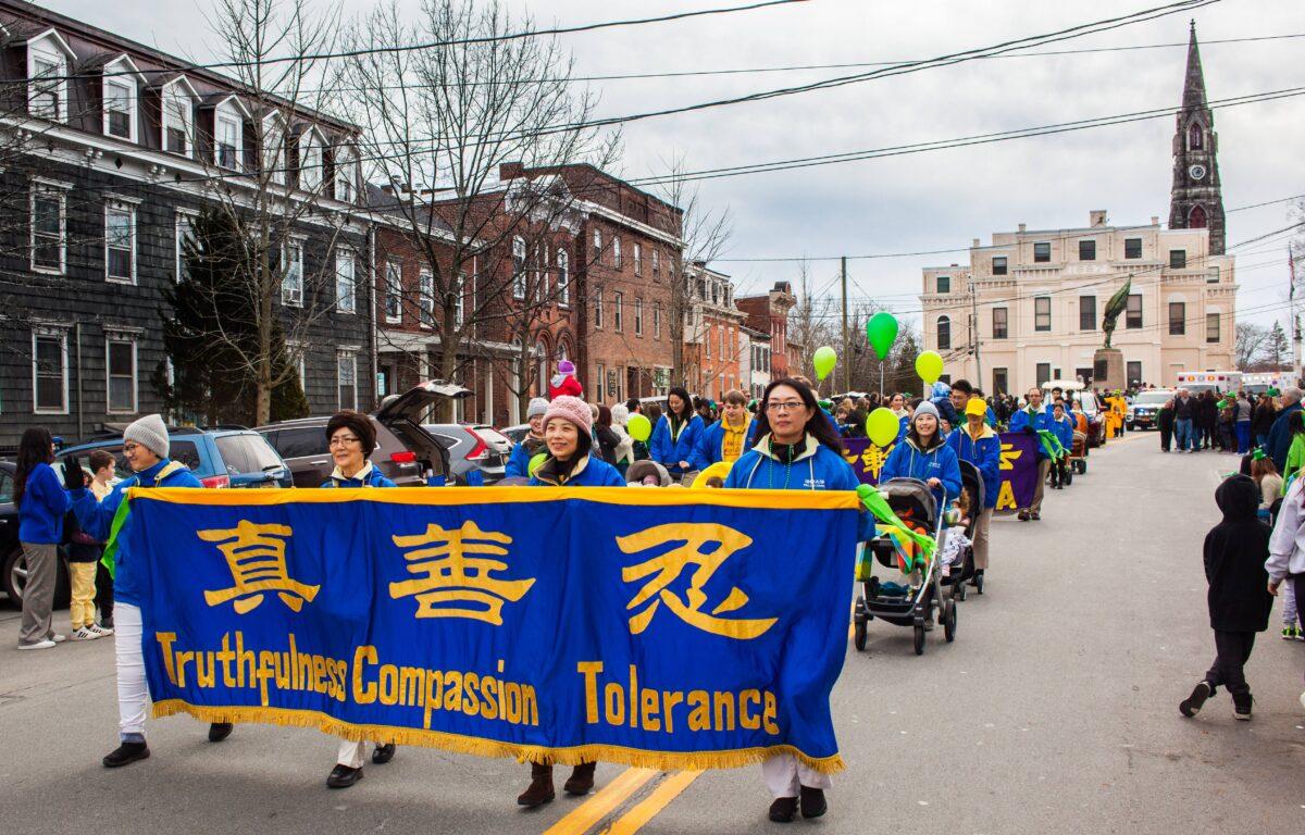 Falun Dafa contingent in the St. Patrick's Day parade in Goshen. N.Y., on March 12, 2023. (Petr Svab/The Epoch Times)