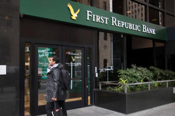 A man stands outside First Republic Bank in downtown San Francisco. (Lear Zhou/The Epoch Times)