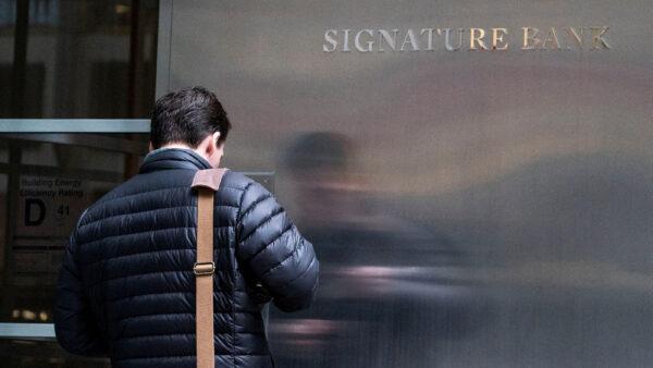 A worker arrives at the Signature Bank headquarters in New York on March 12, 2023. (Eduardo Munoz/Reuters)