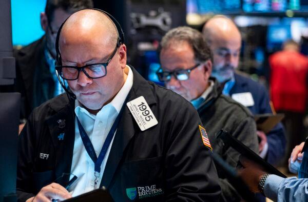 Traders work on the floor at the New York Stock Exchange in New York on March 13, 2023. (Craig Ruttle/AP Photo)