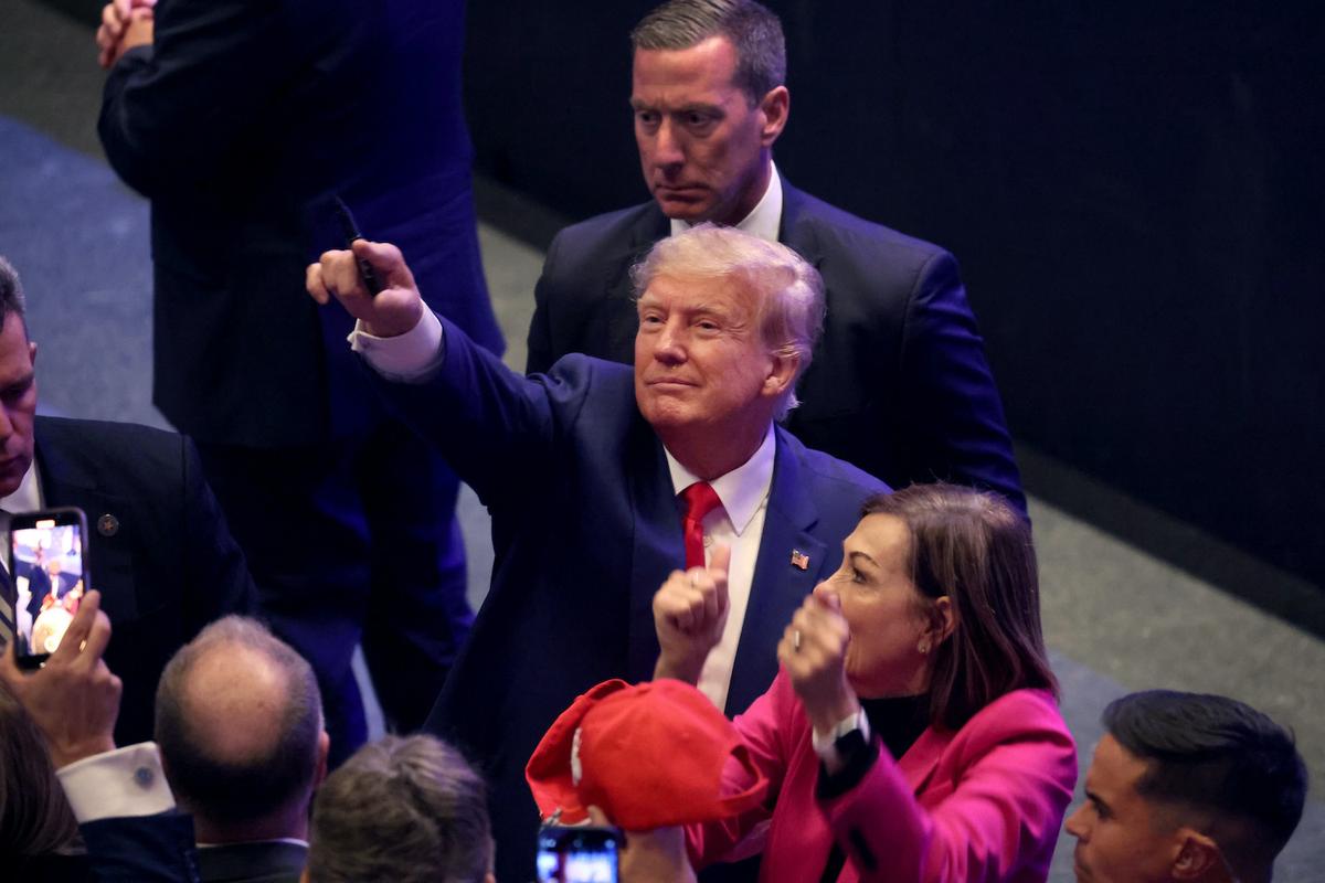 Former President Donald Trump greets guests following an event in Davenport, Iowa, on March 13, 2023. (Scott Olson/Getty Images)