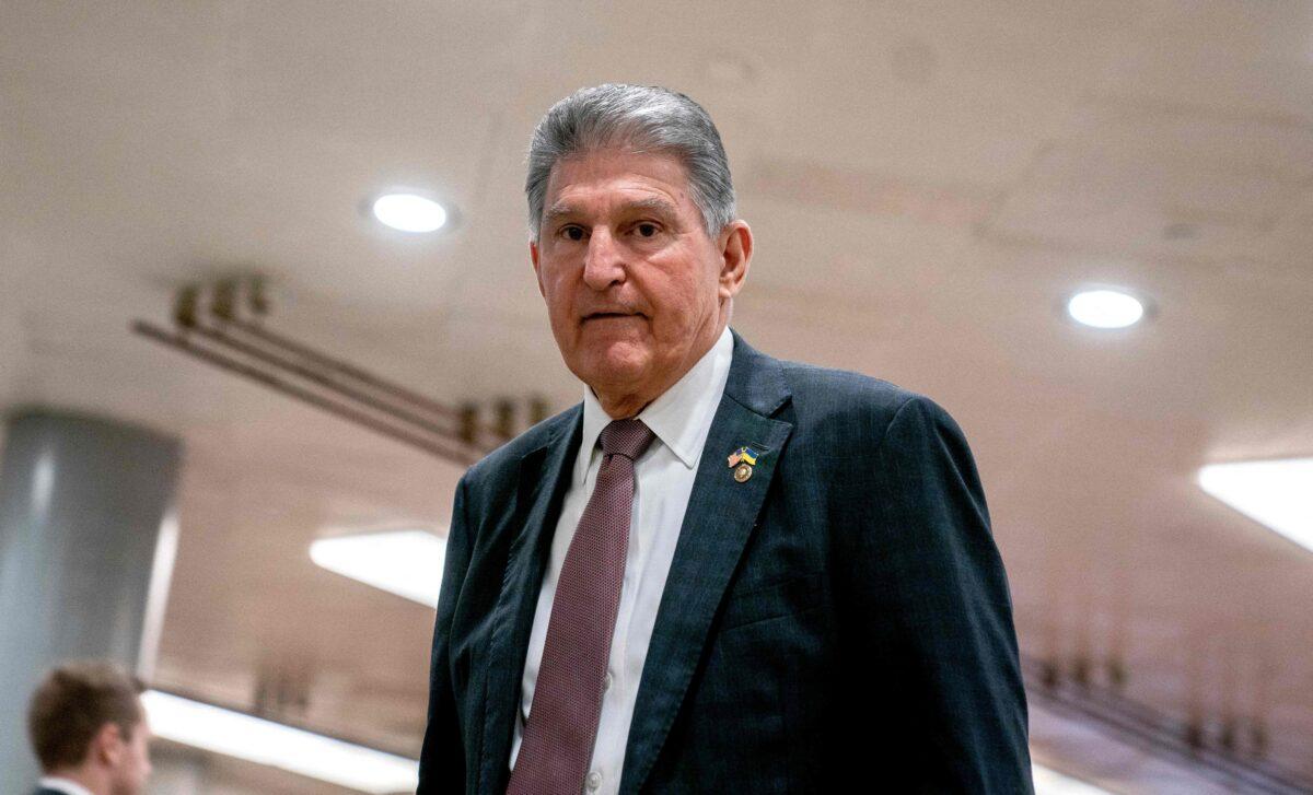 Sen. Joe Manchin (D-W.Va.) arrives for a Senate Armed Services Committee briefing on Ukraine at the U.S. Capitol on March 2, 2023. (Stefani Reynolds/AFP via Getty Images)