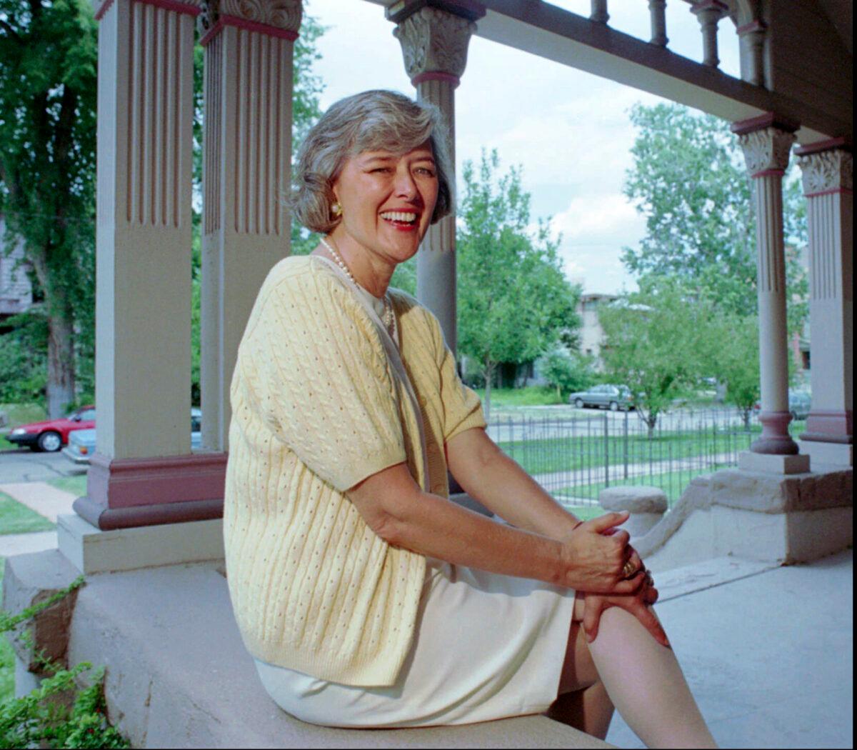 Rep. Pat Schroeder (D-Colo.) sits on the porch outside her Capitol Hill headquarters in Denver on July 18, 1994. (Joe Mahoney/AP Photo)
