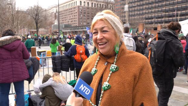 Susan Bjerring watching Philadelphia St. Patrick’s Day Parade on March 12, 2023. (William Huang/The Epoch Times)