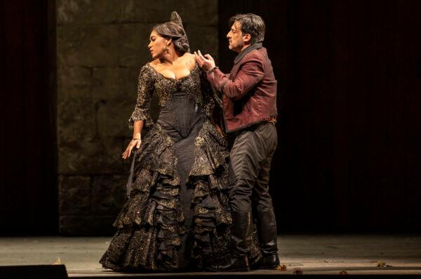 Carmen (mezzo-soprano J’Nai Bridges) rejects the advances of Don Josè (tenor Charles Castronovo), in the Lyric Opera’s production of “Carmen.” (Todd Rosenberg)
