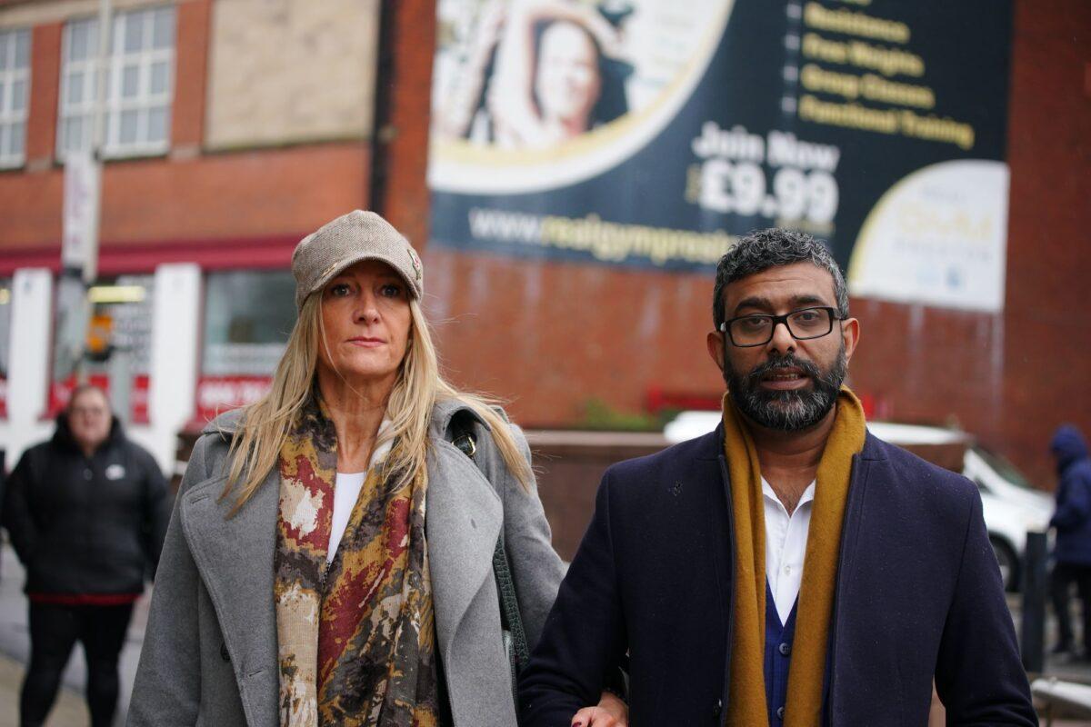 Mohammed Ramzan (R), with his wife Nicola Holt, outside Preston Crown Court in England on March 14, 2023. (PA)