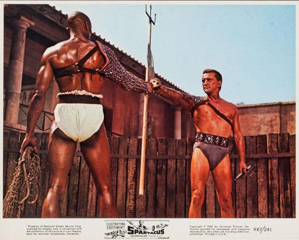 Draba (Woody Strode, L) and Spartacus (Kirk Douglas) fight to the death, in "Spartacus." (MovieStillsDB)