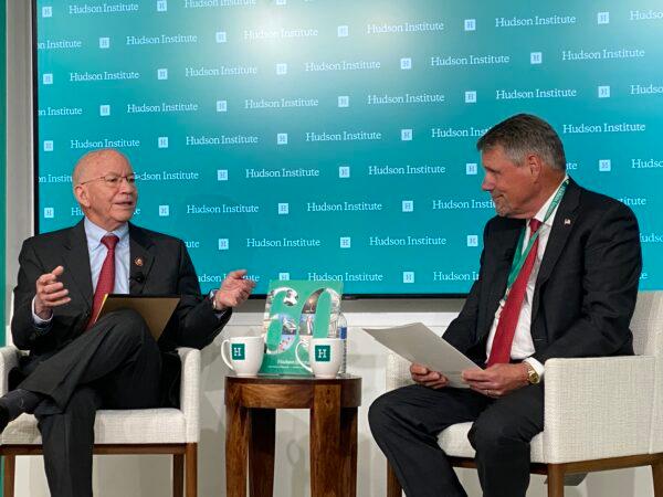 Former House Transportation Committee Chairman Peter DeFazio (L) speaks about Chinese dominance in shipping at the Hudson Institute in Washington on March 14, 2023. (Joseph Lord/The Epoch Times)