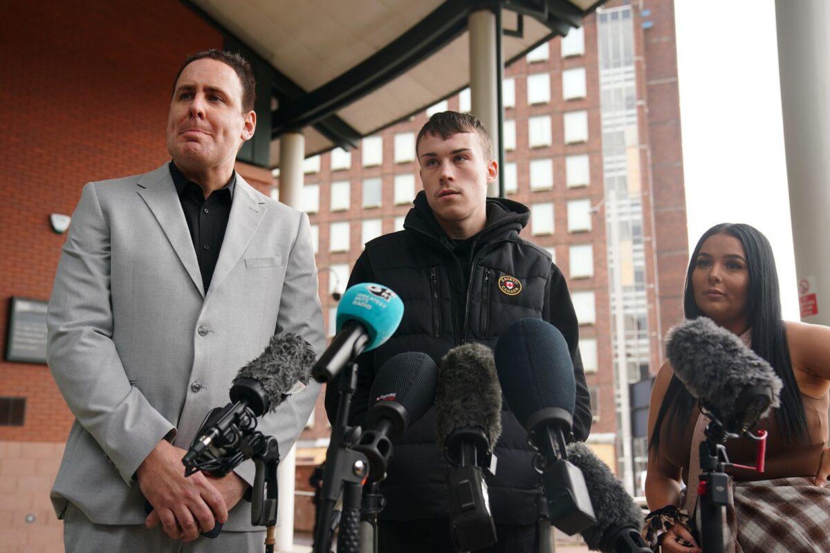 Jordan Trengrove (centre) speaking to reporters outside Preston Crown Court in England on March 14, 2023. (PA)