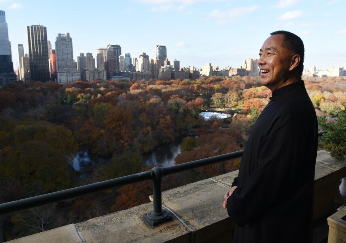 Billionaire Guo Wengui, who's seeking asylum in the United States after accusing officials in his native China of corruption, poses at his New York apartment on Nov. 28, 2017. (Timothy A. Clary/AFP via Getty Images)