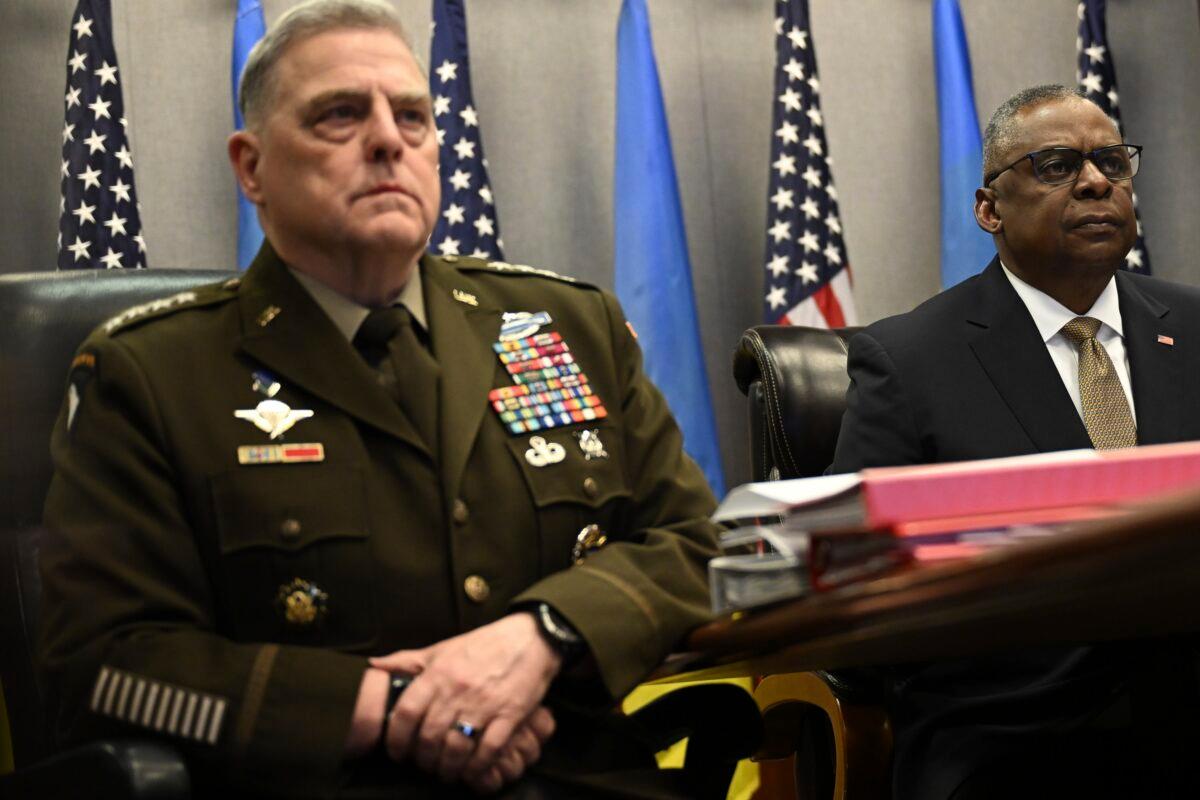 Defense Secretary Lloyd Austin (R) and Chairman of the Joint Chiefs of Staff Gen. Mark Milley, attend a virtual meeting of the Ukraine Defense Contact Group at the Pentagon in Washington on March 15, 2023. (Andrew Caballero-Reynolds/Pool via AP)