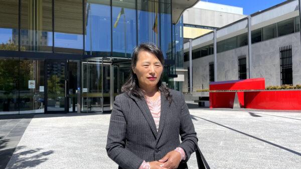 Falun Gong practitioner Nancy Dong outside the ACT Magistrates Court on March 9, 2023, after her assailant Kang Zhao, 30, was fined $3,000 for an incident during the Floriade Flower Festival in Canberra, Australia in October 2022. (Courtesy of Song Hua)