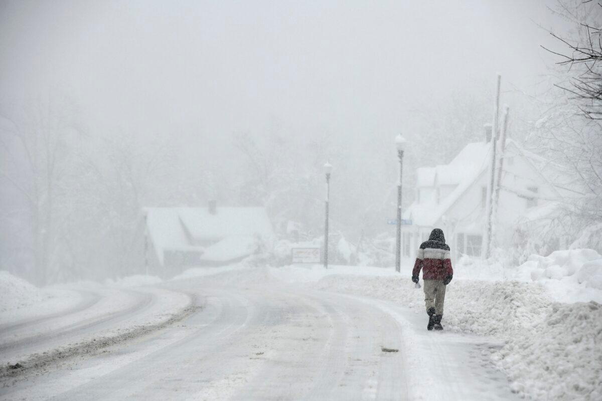 Main Street in Holden, Mass., was at near white out conditions around noon time on March 14, 2023. (Allan Jung/Worcester Telegram & Gazette via AP)