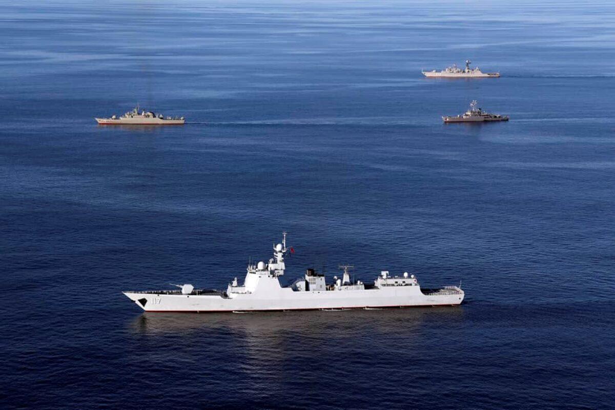 Warships sail in the Sea of Oman during the second day of joint Iran, Russia, and China naval war games on Dec. 28, 2019. (Iranian Army via AP)