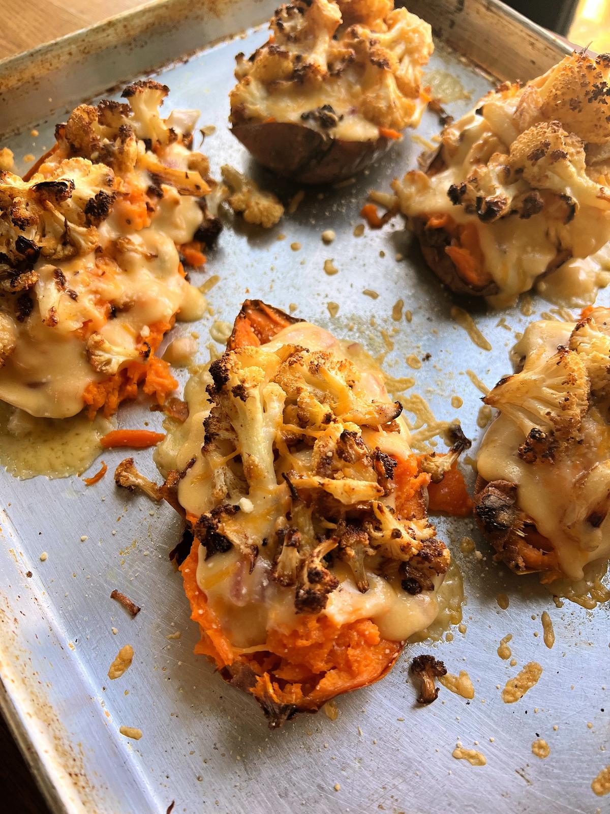 These double-baked cauliflower-stuffed sweet potatoes come together quickly with minimal effort and easy-to-find ingredients. (Gretchen McKay/Pittsburgh Post-Gazette/TNS)