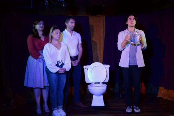 (L–R) Martha (Katie Oxman), Claire (Jennifer Dinolfo), and Frank (J.D. Daw) mourn the loss of a goldfish with Timmy (Julian Diaz-Granados), in "I Love My Family, but... ." (Wendy Gundrum)