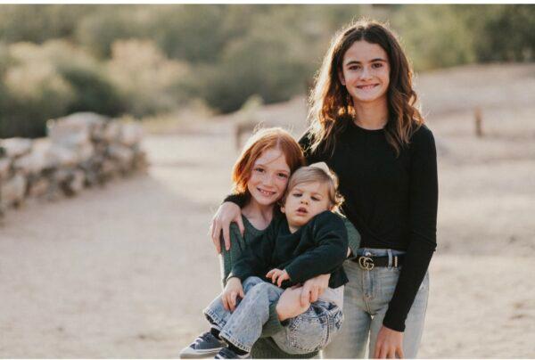 Lucas with big sisters Lily and Olivia. (Photo courtesy of Jason Williams)