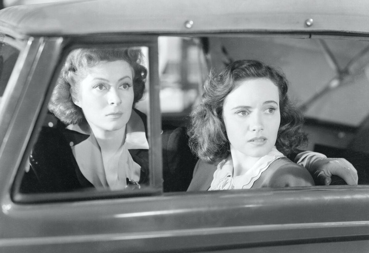 (L) Greer Garson and Teresa Wright in a publicity still for the film "Mrs. Miniver." (MovieStillsDB)