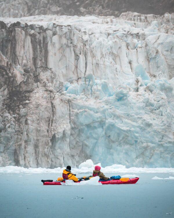 Visitors on a guided kayak tour near Columbia Glacier in Prince William Sound on the southern coast of Alaska. (Travel Alaska)